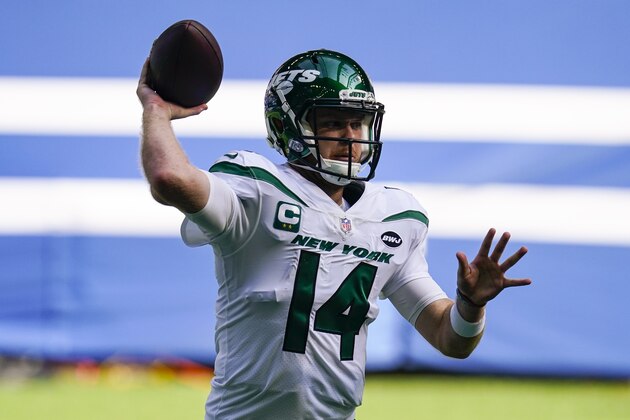 New York Jets quarterback Sam Darnold (14) throws against the Indianapolis Colts in the first half of an NFL football game in Indianapolis, Sunday, Sept. 27, 2020. (AP Photo/Darron Cummings)