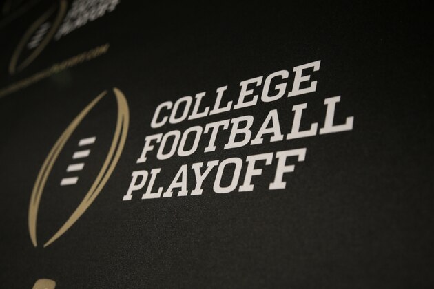 The College Football Playoff logo is printed across a backdrop used during a news conference where the 13 members of the committee were announced, Wednesday, Oct. 16, 2013, in Irving, Texas. Former Secretary of State Condoleezza Rice, former Nebraska coach Tom Osborne and College Football Hall of Fame quarterback Archie Manning are among the 13 people who will be part of the College Football Playoff selection committee in 2014. (AP Photo/Tony Gutierrez)