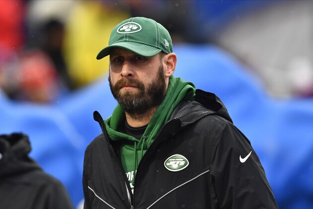 New York Jets head coach Adam Gase walks the field as his team warms up before an NFL football game against the Buffalo Bills Sunday, Aug. 26, 2018, in Orchard Park, N.Y. (AP Photo/Adrian Kraus)