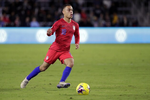 United States defender Sergino Dest moves the ball against Canada during the second half of a CONCACAF Nations League soccer match Friday, Nov. 15, 2019, in Orlando, Fla. (AP Photo/John Raoux)