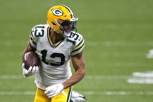 Green Bay Packers wide receiver Allen Lazard (13) carries in the second half of an NFL football game against the New Orleans Saints in New Orleans, Sunday, Sept. 27, 2020. (AP Photo/Butch Dill)