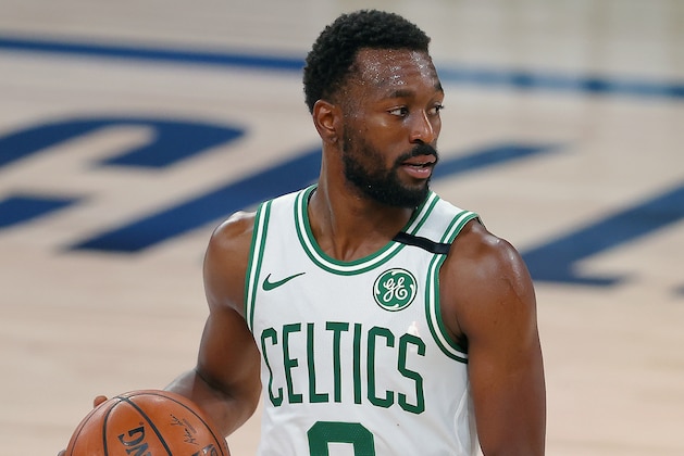 Boston Celtics' Kemba Walker handles the ball during the second half of an NBA basketball game against the Memphis Grizzlies Tuesday, Aug. 11, 2020, in Lake Buena Vista, Fla. (AP Photo/Mike Ehrmann, Pool)