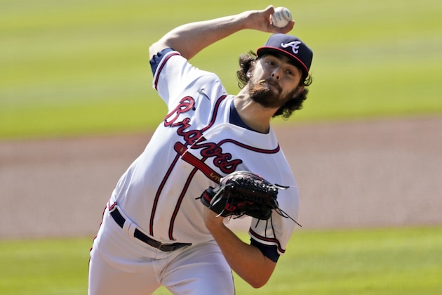 Atlanta Braves starting pitcher Ian Anderson throws during the first inning in Game 2 of a National League wild-card baseball series, Thursday, Oct. 1, 2020, in Atlanta. (AP Photo/John Bazemore)