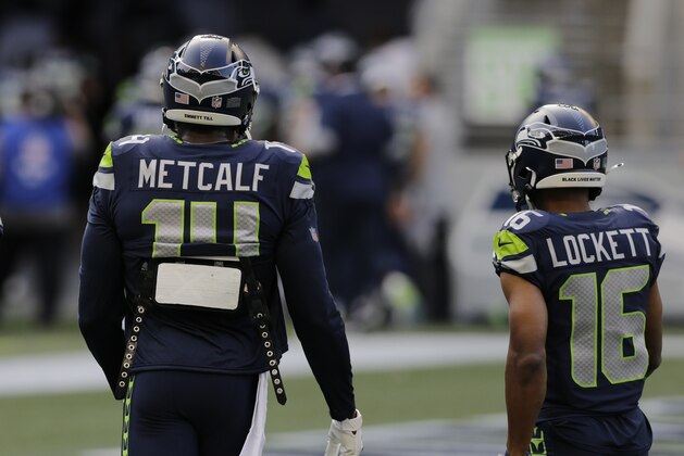 Seattle Seahawks' David Moore, DK Metcalf, Tyler Lockett wear the name of Emmett Till and the phase