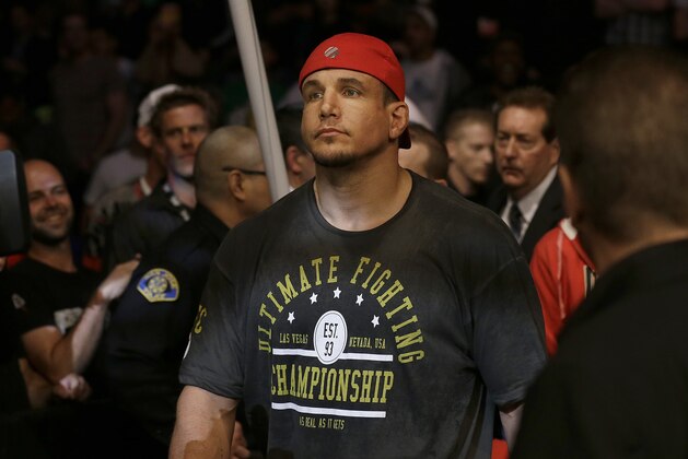 Frank Mir walks to the ring before fighting Daniel Cormier in a UFC heavyweight mixed martial arts fight in San Jose, Calif., Saturday, April 20, 2013. (AP Photo/Jeff Chiu)