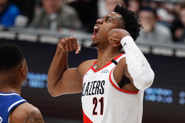Portland Trail Blazers center Hassan Whiteside celebrates a basket against the Sacramento Kings during the second half of an NBA basketball game in Portland, Ore., Saturday, March 7, 2020. Sacramento won 123-111. (AP Photo/Steve Dipaola)