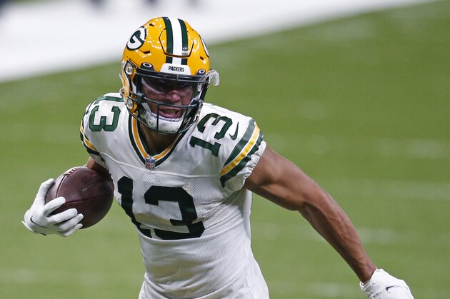 Green Bay Packers wide receiver Allen Lazard (13) carries in the second half of an NFL football game against the New Orleans Saints in New Orleans, Sunday, Sept. 27, 2020. (AP Photo/Butch Dill)