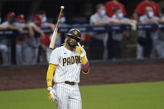 San Diego Padres' Fernando Tatis Jr. tosses his bat after hitting a two-run home run during the seventh inning of Game 2 of the team's National League wild-card baseball series against the St. Louis Cardinals, Thursday, Oct. 1, 2020, in San Diego. (AP Photo/Gregory Bull) San Diego Padres' Fernando Tatis Jr. tosses his bat after hitting a two-run home run during the seventh inning of Game 2 of the team's National League wild-card baseball series against the St. Louis Cardinals, Thursday, Oct. 1, 2020, in San Diego. (AP Photo/Gregory Bull)