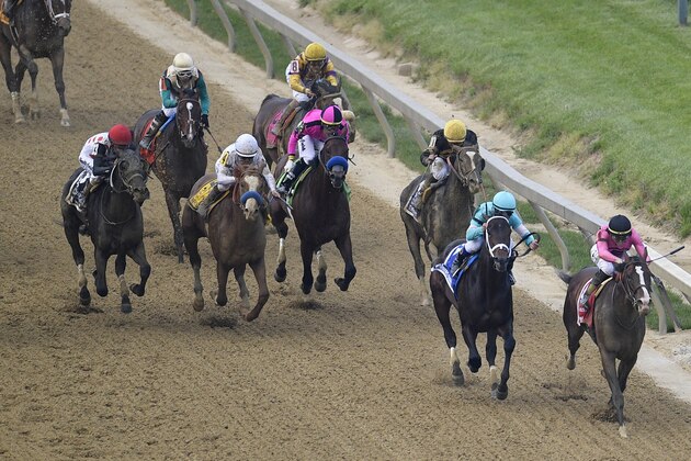 War of Will, ridden by Tyler Gaffalione, right, prepares to win the Preakness Stakes horse race at Pimlico Race Course, Saturday, May 18, 2019, in Baltimore. (AP Photo/Nick Wass)