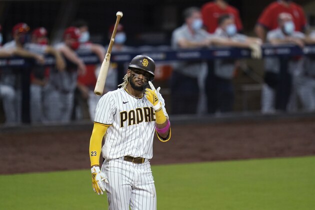 San Diego Padres' Fernando Tatis Jr. tosses his bat after hitting a two-run home run during the seventh inning of Game 2 of the team's National League wild-card baseball series against the St. Louis Cardinals, Thursday, Oct. 1, 2020, in San Diego. (AP Photo/Gregory Bull) San Diego Padres' Fernando Tatis Jr. tosses his bat after hitting a two-run home run during the seventh inning of Game 2 of the team's National League wild-card baseball series against the St. Louis Cardinals, Thursday, Oct. 1, 2020, in San Diego. (AP Photo/Gregory Bull)