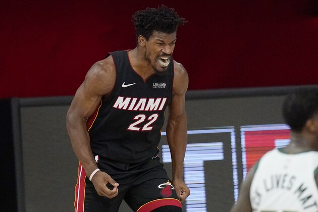 Miami Heat's Jimmy Butler (22) celebrates after a dunk in the second half of an NBA conference semifinal playoff basketball game against the Milwaukee Bucks Friday, Sept. 4, 2020, in Lake Buena Vista, Fla. (AP Photo/Mark J. Terrill) Miami Heat's Jimmy Butler (22) celebrates after a dunk in the second half of an NBA conference semifinal playoff basketball game against the Milwaukee Bucks Friday, Sept. 4, 2020, in Lake Buena Vista, Fla. (AP Photo/Mark J. Terrill)
