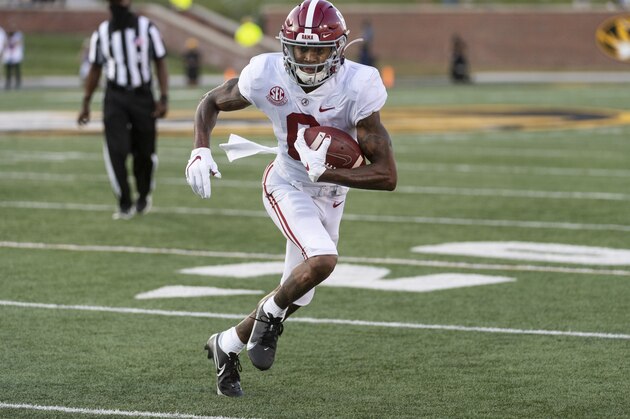 Alabama wide receiver DeVonta Smith runs the ball during the first quarter of an NCAA college football game against Missouri Saturday, Sept. 26, 2020, in Columbia, Mo. (AP Photo/L.G. Patterson)