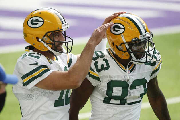 Green Bay Packers quarterback Aaron Rodgers, left, reacts with teammate wide receiver Marquez Valdes-Scantling during the second half of an NFL football game against the Minnesota Vikings, Sunday, Sept. 13, 2020, in Minneapolis. (AP Photo/Bruce Kluckhohn) Green Bay Packers quarterback Aaron Rodgers, left, reacts with teammate wide receiver Marquez Valdes-Scantling during the second half of an NFL football game against the Minnesota Vikings, Sunday, Sept. 13, 2020, in Minneapolis. (AP Photo/Bruce Kluckhohn)