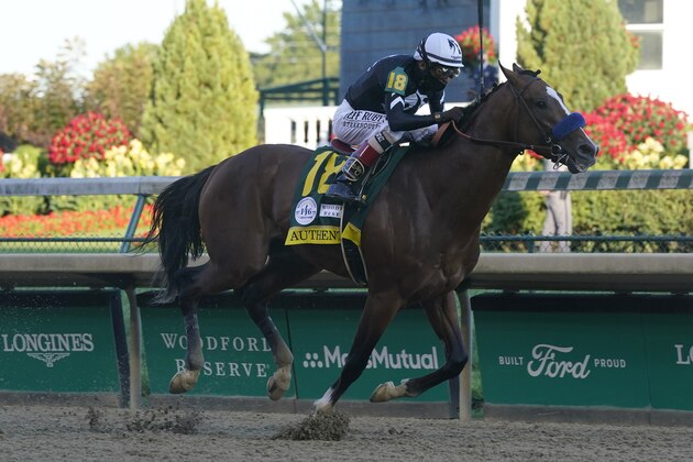 Jockey John Velazquez riding Authentic gallops to the finish line to win the 146th running of the Kentucky Derby at Churchill Downs, Saturday, Sept. 5, 2020, in Louisville, Ky. (AP Photo/Darron Cummings)