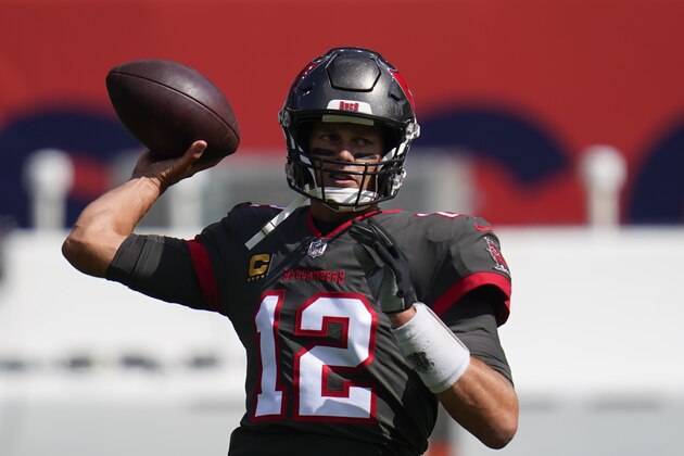 Tampa Bay Buccaneers quarterback Tom Brady warms up before an NFL football game against the Denver Broncos, Sunday, Sept. 27, 2020, in Denver. (AP Photo/Jack Dempsey) Tampa Bay Buccaneers quarterback Tom Brady warms up before an NFL football game against the Denver Broncos, Sunday, Sept. 27, 2020, in Denver. (AP Photo/Jack Dempsey)