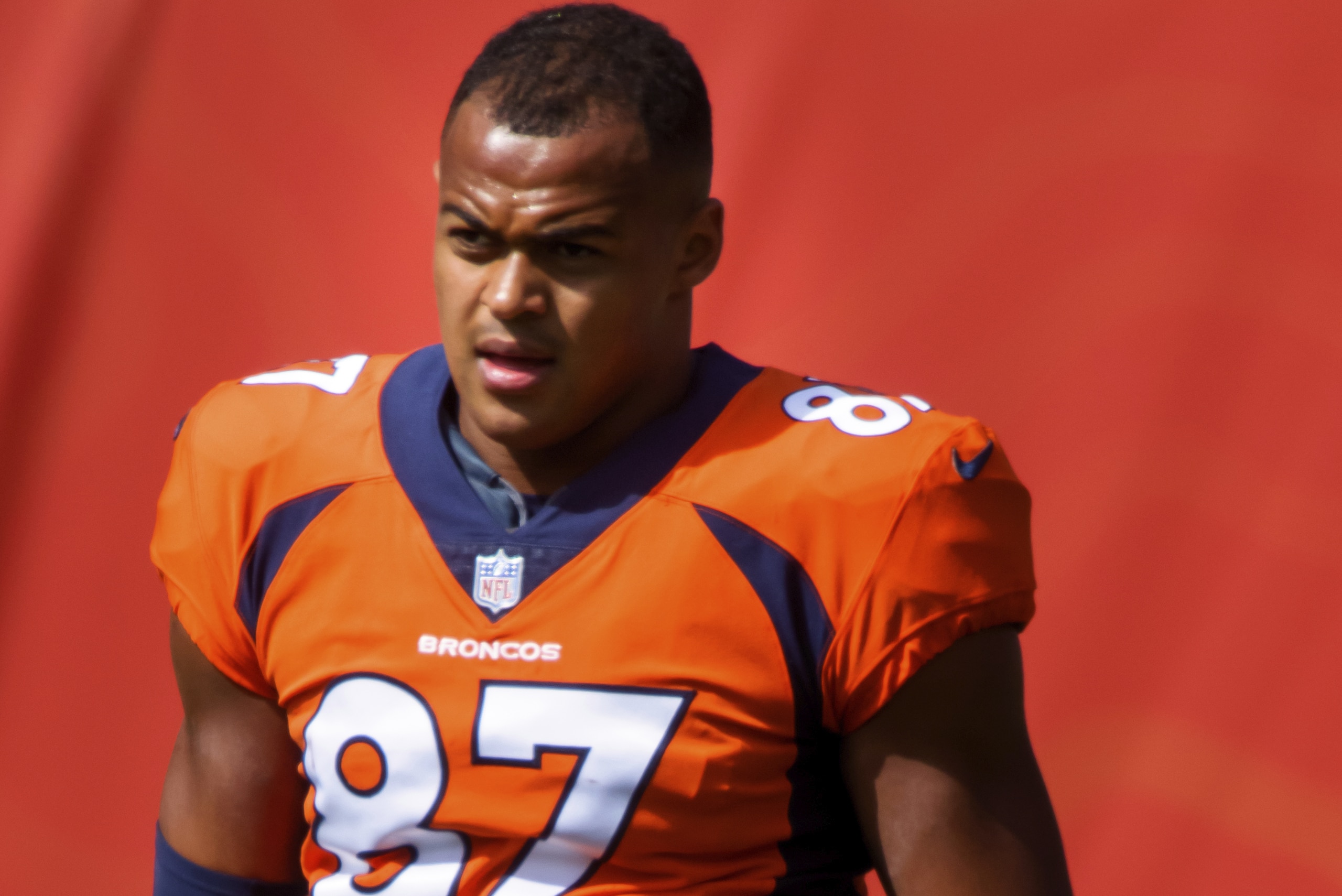 Denver Broncos tight end Noah Fant (87) walks on the field while warming up against the Tampa Bay Buccaneers before NFL football game, Sunday, Sept.. 27, 2020, in Denver. (AP Photo/Justin Edmonds)