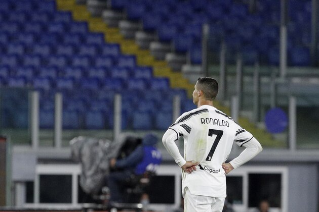 Juventus' Cristiano Ronaldo gestures after Roma's Jordan Veretouts scores his side's second goal during the Italian Serie A soccer match between Roma and Juventus at Rome's Olympic stadium, Sunday, Sept. 27, 2020. (AP Photo/Gregorio Borgia)