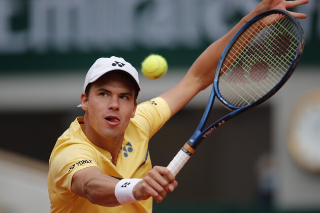 Germany's Daniel Altmaier plays a shot against Italy's Matteo Berrettini in the third round match of the French Open tennis tournament at the Roland Garros stadium in Paris, France, Saturday, Oct. 3, 2020. (AP Photo/Christophe Ena)