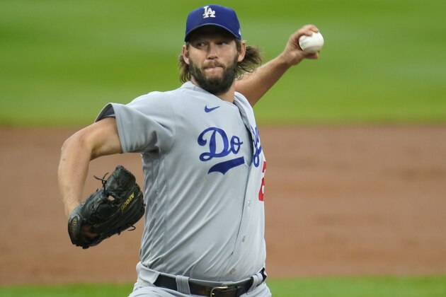 Los Angeles Dodgers starting pitcher Clayton Kershaw works against the Colorado Rockies during the first inning of a baseball game Saturday, Sept. 19, 2020, in Denver. (AP Photo/David Zalubowski)