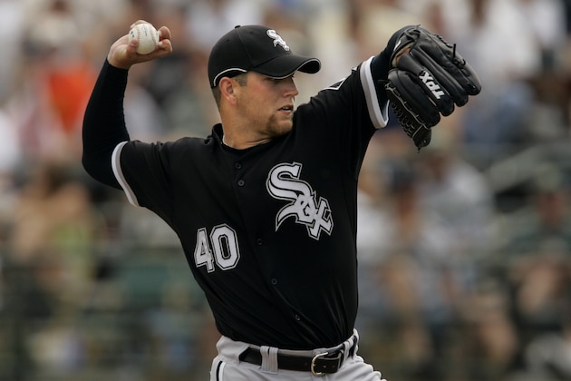 Chicago White Sox's Charlie Haeger pitches to the Oakland Athletics in the first inning of a spring training baseball game in Phoenix, Ariz., Tuesday, March 20, 2007. (AP Photo/Jeff Chiu)