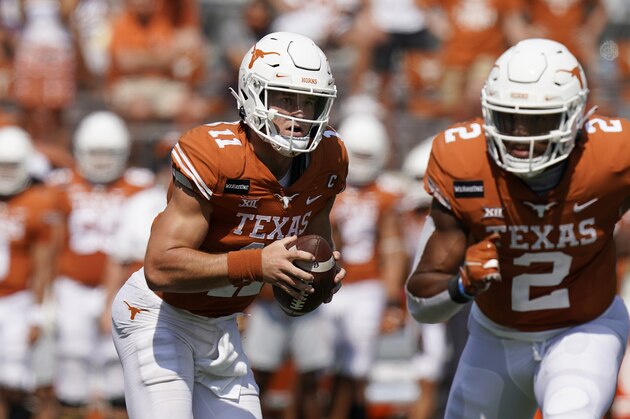 Texas quarterback Sam Ehlinger (11) looks to throw against TCU during the first half of an NCAA college football game, Saturday, Oct. 3, 2020, in Austin, Texas. (AP Photo/Eric Gay)