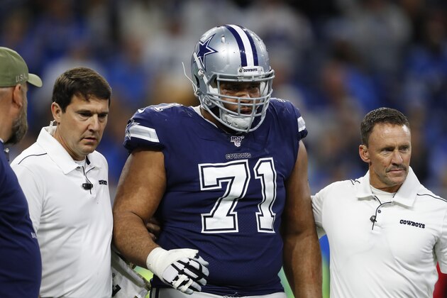 Dallas Cowboys offensive tackle La'el Collins (71) is helped off the field during the second half of an NFL football game against the Detroit Lions, Sunday, Nov. 17, 2019, in Detroit. (AP Photo/Paul Sancya) Dallas Cowboys offensive tackle La'el Collins (71) is helped off the field during the second half of an NFL football game against the Detroit Lions, Sunday, Nov. 17, 2019, in Detroit. (AP Photo/Paul Sancya)
