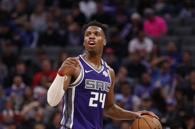 Sacramento Kings guard Buddy Hield dribbles down court during the second half of an NBA basketball game against the Toronto Raptors in Sacramento, Calif., Sunday, March 8, 2020. The Raptors won 118-113. (AP Photo/Rich Pedroncelli)