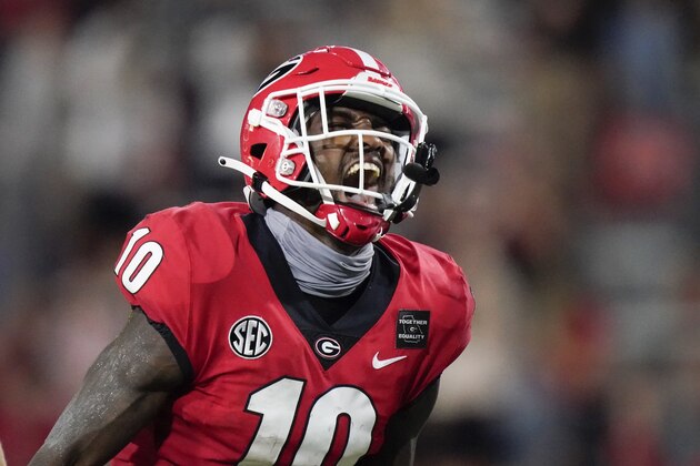 Georgia wide receiver Kearis Jackson (10) celebrates after a catch during the first half of the team's NCAA college football game against Auburn, Saturday, Oct. 3, 2020, in Athens, Ga. (AP Photo/Brynn Anderson)