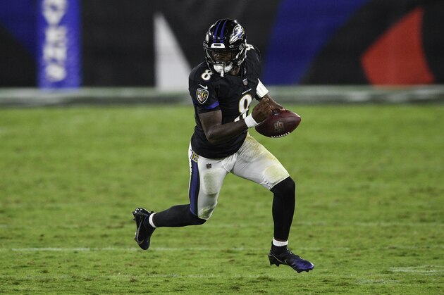Baltimore Ravens quarterback Lamar Jackson (8) runs with the ball during the second half of an NFL football game against the Kansas City Chiefs, Monday, Sept. 28, 2020, in Baltimore. The Chiefs won 34-20. (AP Photo/Nick Wass) Baltimore Ravens quarterback Lamar Jackson (8) runs with the ball during the second half of an NFL football game against the Kansas City Chiefs, Monday, Sept. 28, 2020, in Baltimore. The Chiefs won 34-20. (AP Photo/Nick Wass)