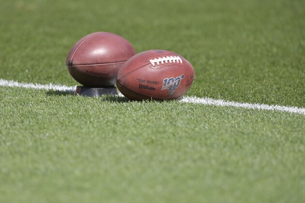 Footballs rest on the field prior to an NFL football game between the Tennessee Titans and the Cleveland Browns, Sunday, Sept. 8, 2019, in Cleveland. Tennessee won 43-13. (AP Photo/David Richard) Footballs rest on the field prior to an NFL football game between the Tennessee Titans and the Cleveland Browns, Sunday, Sept. 8, 2019, in Cleveland. Tennessee won 43-13. (AP Photo/David Richard)