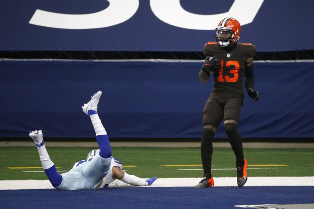 Dallas Cowboys safety Darian Thompson, left, is unable to prevent Cleveland Browns wide receiver Odell Beckham Jr. (13) from catching a touchdown pass in the first half of an NFL football game in Arlington, Texas, Sunday, Oct. 4, 2020. (AP Photo/Michael Ainsworth) Dallas Cowboys safety Darian Thompson, left, is unable to prevent Cleveland Browns wide receiver Odell Beckham Jr. (13) from catching a touchdown pass in the first half of an NFL football game in Arlington, Texas, Sunday, Oct. 4, 2020. (AP Photo/Michael Ainsworth)