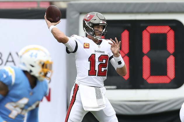 Tampa Bay Buccaneers quarterback Tom Brady (12) throws a pass against the Los Angeles Chargers during the first half of an NFL football game Sunday, Oct. 4, 2020, in Tampa, Fla. (AP Photo/Mark LoMoglio)