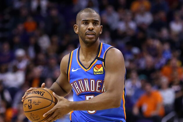 Oklahoma City Thunder guard Chris Paul looks to pass the ball against the Phoenix Suns during the first half of an NBA basketball game Friday, Jan. 31, 2020, in Phoenix. The Thunder defeated the Suns 111-107. (AP Photo/Ross D. Franklin)