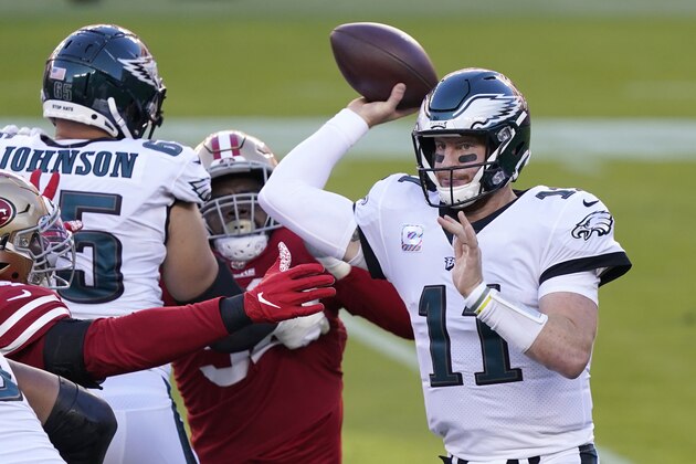 Philadelphia Eagles quarterback Carson Wentz (11) passes against the San Francisco 49ers during the first half of an NFL football game in Santa Clara, Calif., Sunday, Oct. 4, 2020. (AP Photo/Tony Avelar) Philadelphia Eagles quarterback Carson Wentz (11) passes against the San Francisco 49ers during the first half of an NFL football game in Santa Clara, Calif., Sunday, Oct. 4, 2020. (AP Photo/Tony Avelar)