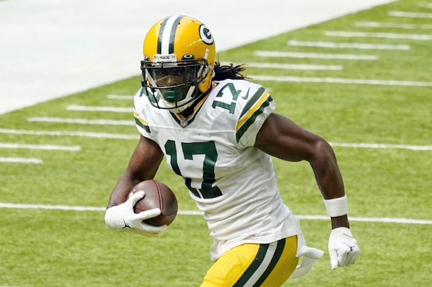 Green Bay Packers wide receiver Davante Adams (17) carries the ball in the first half of an NFL football game against the Minnesota Vikings, Sunday, Sept. 13, 2020, in Minneapolis. (AP Photo/Jim Mone)