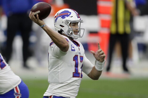 Buffalo Bills quarterback Josh Allen (17) throws against the Las Vegas Raiders during the first half of an NFL football game, Sunday, Oct. 4, 2020, in Las Vegas. (AP Photo/Isaac Brekken)