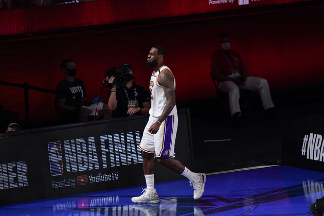 Los Angeles Lakers' LeBron James (23) reacts after he shoots against the Miami Heat during the second half in Game 3 of basketball's NBA Finals, Sunday, Oct. 4, 2020, in Lake Buena Vista, Fla. (AP Photo/Mark J. Terrill)