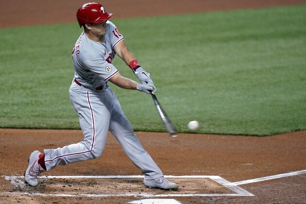 Philadelphia Phillies' J.T. Realmuto grounds out, scoring Rhys Hoskins, during the first inning of a baseball game against the Miami Marlins, Thursday, Sept. 10, 2020, in Miami. (AP Photo/Wilfredo Lee)