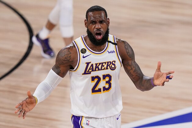 Los Angeles Lakers' LeBron James (23) reacts after no foul was called against the Miami Heat during the second half in Game 3 of basketball's NBA Finals, Sunday, Oct. 4, 2020, in Lake Buena Vista, Fla. (AP Photo/Mark J. Terrill) Los Angeles Lakers' LeBron James (23) reacts after no foul was called against the Miami Heat during the second half in Game 3 of basketball's NBA Finals, Sunday, Oct. 4, 2020, in Lake Buena Vista, Fla. (AP Photo/Mark J. Terrill)