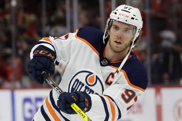 Edmonton Oilers center Connor McDavid warms up before an NHL hockey game against the Chicago Blackhawks in Chicago, Thursday, March 5, 2020. (AP Photo/Nam Y. Huh) Edmonton Oilers center Connor McDavid warms up before an NHL hockey game against the Chicago Blackhawks in Chicago, Thursday, March 5, 2020. (AP Photo/Nam Y. Huh)