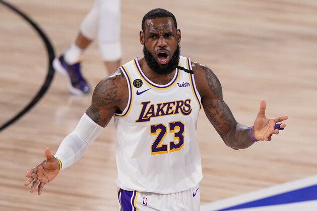 Los Angeles Lakers' LeBron James (23) reacts after no foul was called against the Miami Heat during the second half in Game 3 of basketball's NBA Finals, Sunday, Oct. 4, 2020, in Lake Buena Vista, Fla. (AP Photo/Mark J. Terrill) Los Angeles Lakers' LeBron James (23) reacts after no foul was called against the Miami Heat during the second half in Game 3 of basketball's NBA Finals, Sunday, Oct. 4, 2020, in Lake Buena Vista, Fla. (AP Photo/Mark J. Terrill)