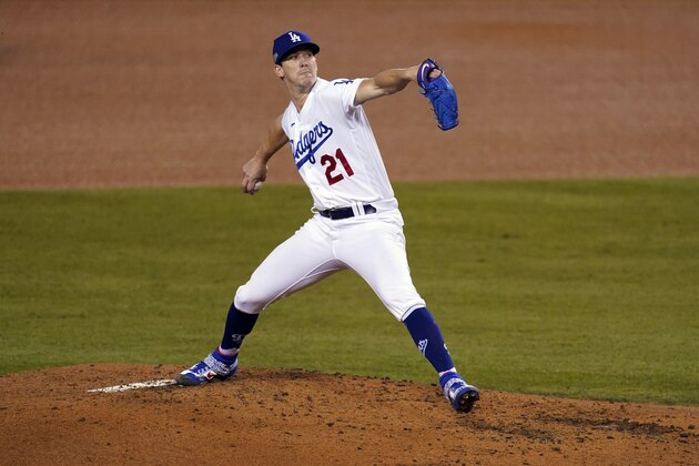 Los Angeles Dodgers starting pitcher Walker Buehler winds up during the third inning of Game 1 of the team's National League wild-card baseball series against the Milwaukee Brewers on Wednesday, Sept. 30, 2020, in Los Angeles. (AP Photo/Ashley Landis)