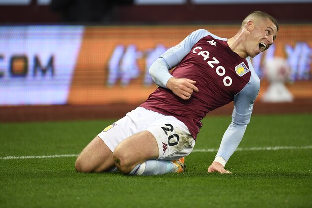 Aston Villa's Ross Barkley celebrates after scoring his side's fifth goal during the English Premier League soccer match between Aston Villa and Liverpool at the Villa Park stadium in Birmingham, England, Sunday, Oct. 4, 2020. (Peter Powell/Pool via AP)