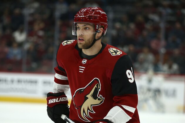 Arizona Coyotes left wing Taylor Hall skates to the puck during the first period of an NHL hockey game against the San Jose Sharks Tuesday, Jan. 14, 2020, in Glendale, Ariz. The Coyotes defeated the Sharks 6-3. (AP Photo/Ross D. Franklin)