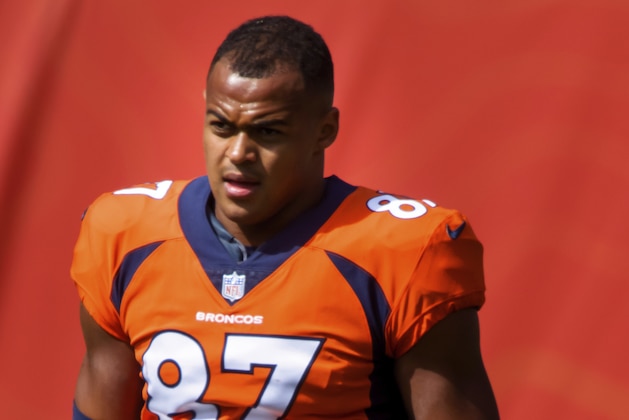 Denver Broncos tight end Noah Fant (87) walks on the field while warming up against the Tampa Bay Buccaneers before NFL football game, Sunday, Sept.. 27, 2020, in Denver. (AP Photo/Justin Edmonds)