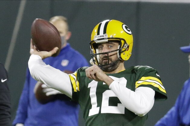 Green Bay Packers quarterback Aaron Rodgers (12) throws before an NFL football game against the Atlanta Falcons, Monday, Oct. 5, 2020, in Green Bay, Wis. (AP Photo/Mike Roemer)