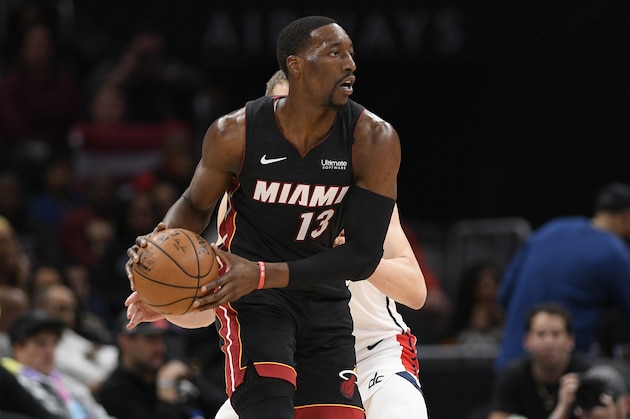 Miami Heat forward Bam Adebayo (13) handles the ball during the second half of an NBA basketball game against the Washington Wizards, Sunday, March 8, 2020, in Washington. The Heat won 100-89. (AP Photo/Nick Wass) Miami Heat forward Bam Adebayo (13) handles the ball during the second half of an NBA basketball game against the Washington Wizards, Sunday, March 8, 2020, in Washington. The Heat won 100-89. (AP Photo/Nick Wass)