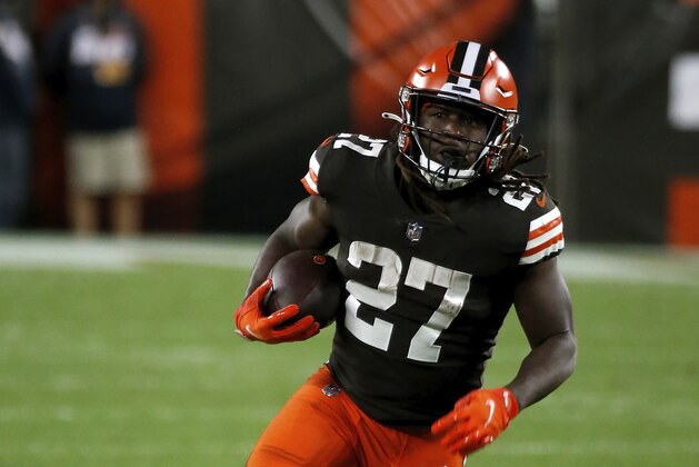 Cleveland Browns running back Kareem Hunt (27) runs with the ball during an NFL football game against the Cincinnati Bengals, Thursday, Sept. 17, 2020, in Cleveland. (AP Photo/Kirk Irwin)