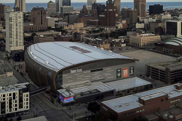 FILE - This July 29, 2020, file photo shows the Fiserv Forum, home of the Milwaukee Bucks NBA basketball team, in Milwaukee. Voting will look a little different this November. NBA owners have pledged to open arenas in Salt Lake City and elsewhere as part of an agreement they made with players to combat racial injustice. (AP Photo/Morry Gash, File)