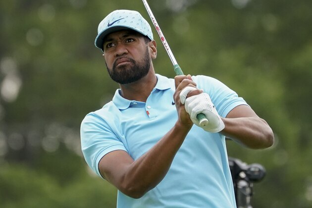 Tony Finau, of the United States, plays his shot from the third tee during the second round of the US Open Golf Championship, Friday, Sept. 18, 2020, in Mamaroneck, N.Y. (AP Photo/John Minchillo)